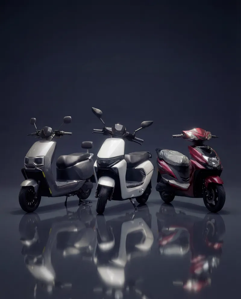 EVE E10, E20 and E05 electric scooters lined up in a dark studio